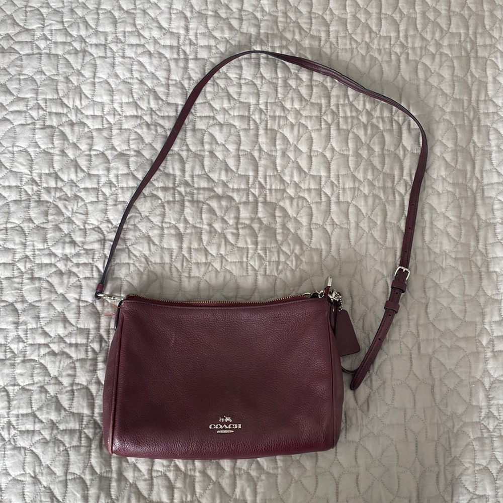 Purple coach bag. Small to medium size.